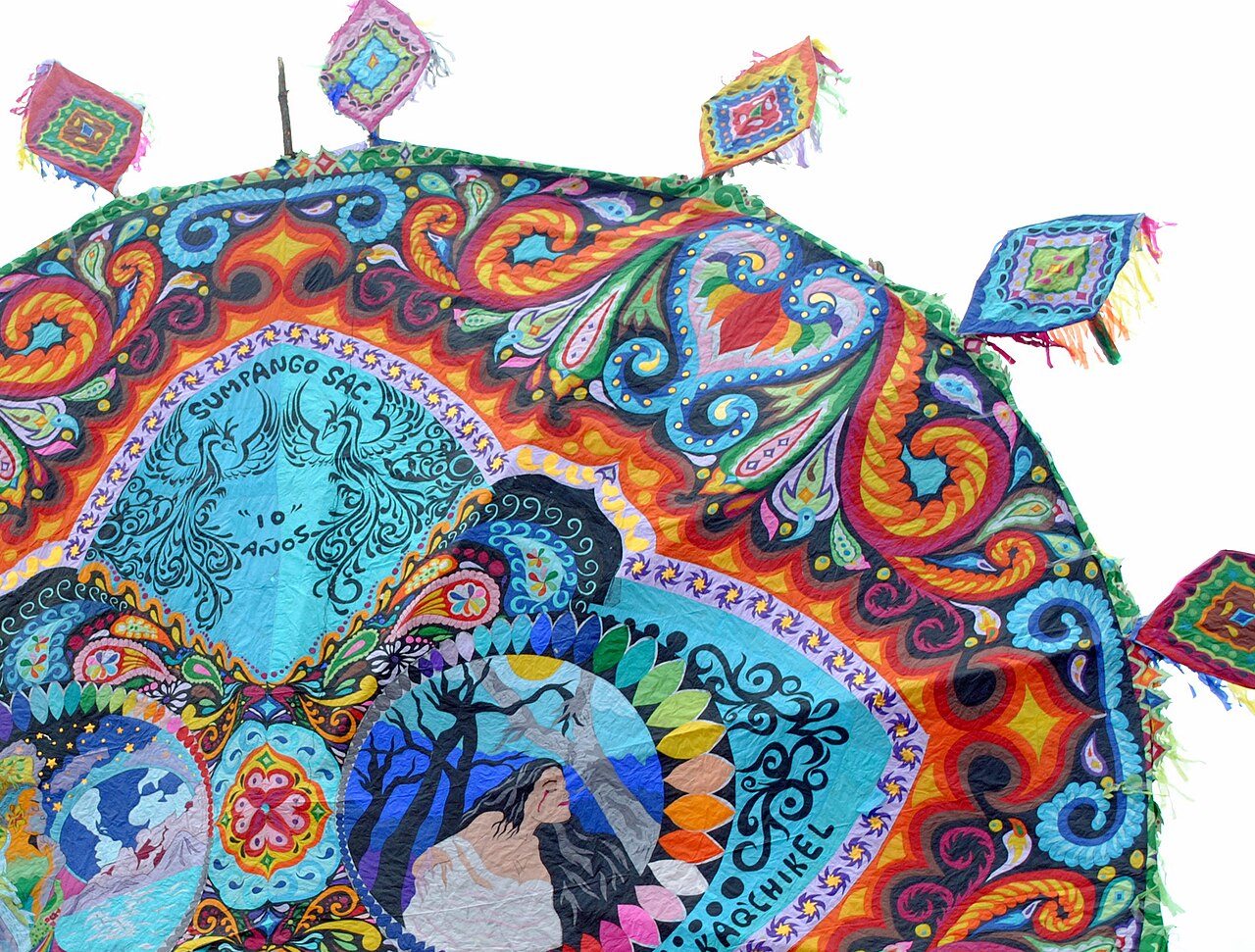 Overlapping coloured paper shapes and lettering on a kite.
