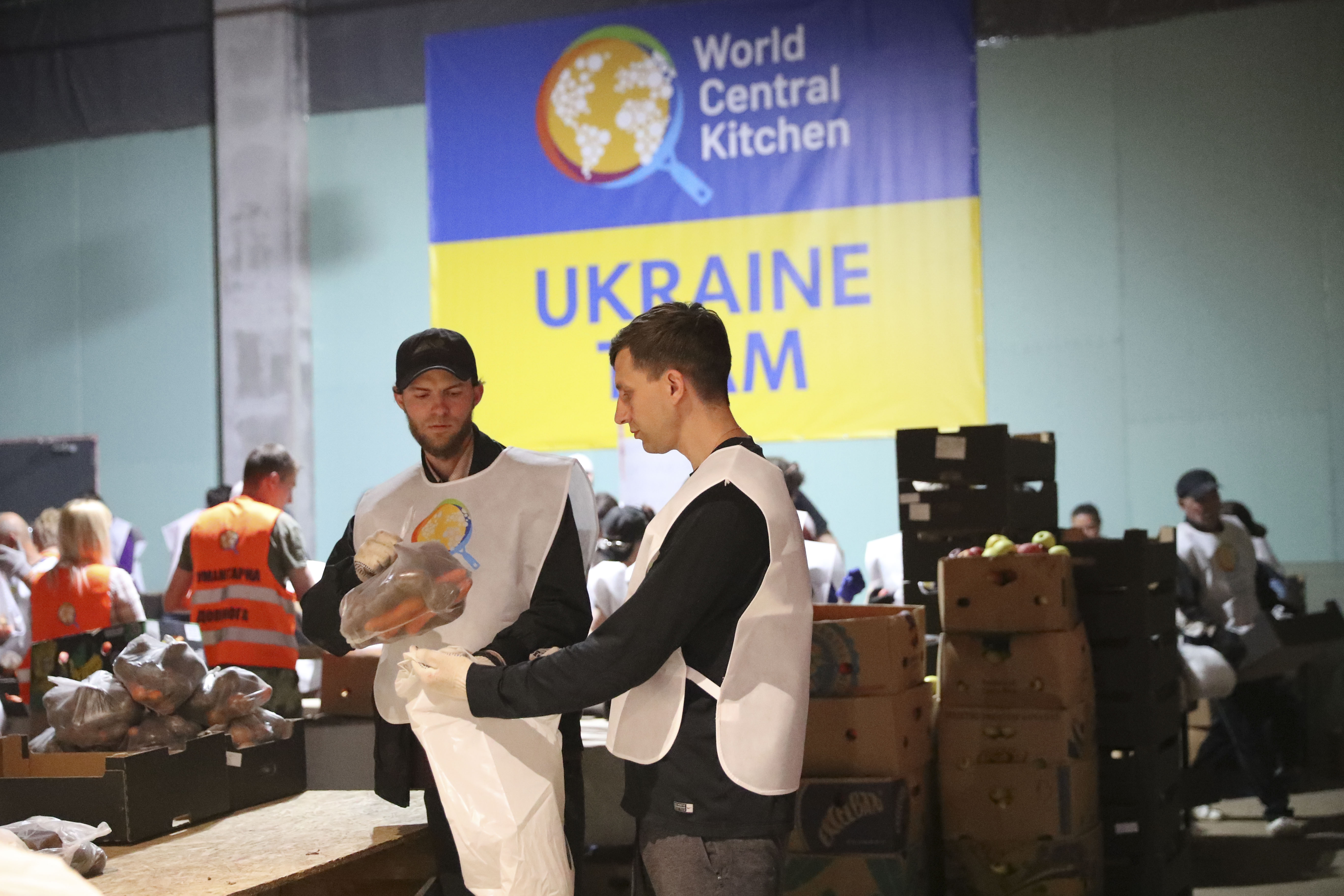 World Central Kitchen’s Ukraine team packs food in June 2022, another example of the coordinated work behind wartime food assistance.